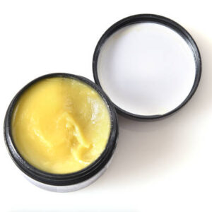 Overhead view of a jar of cbd or hemp salve