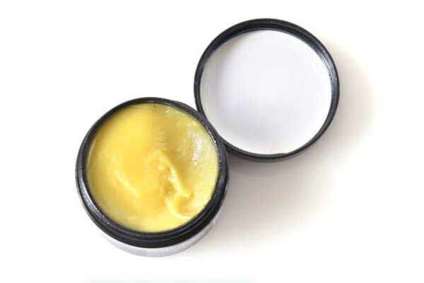 Overhead view of a jar of cbd or hemp salve